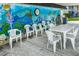 Outdoor community space with tables and chairs at 202 47Th Avenue W Dr # 334, Bradenton, FL 34207