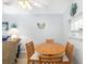 Small dining area with round table and chairs at 202 47Th Avenue W Dr # 334, Bradenton, FL 34207