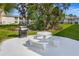 Community patio with seating and grill at 202 47Th Avenue W Dr # 334, Bradenton, FL 34207