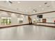 Bright community room with mirrors and wood flooring, ideal for exercise or events at 20289 Benissimo Dr, Venice, FL 34293