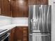 Stainless steel refrigerator in a modern kitchen at 20289 Benissimo Dr, Venice, FL 34293