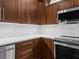 Modern kitchen with white quartz countertops at 20289 Benissimo Dr, Venice, FL 34293