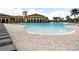 Expansive resort-style pool with plenty of lounge chairs at 20289 Benissimo Dr, Venice, FL 34293