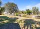 Large backyard leading to the canal at 207 Waterway Ne Cir, Port Charlotte, FL 33952