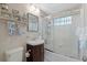 Clean bathroom with tub, shower, and vanity at 207 Waterway Ne Cir, Port Charlotte, FL 33952