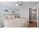 Charming bedroom with a queen-size bed and ensuite bathroom at 207 Waterway Ne Cir, Port Charlotte, FL 33952