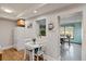 Kitchen with light wood cabinets, granite countertops, and white appliances at 207 Waterway Ne Cir, Port Charlotte, FL 33952