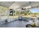 Cozy screened porch overlooking backyard at 207 Waterway Ne Cir, Port Charlotte, FL 33952