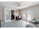 Relaxing sunroom with French doors and comfortable seating at 207 Waterway Ne Cir, Port Charlotte, FL 33952