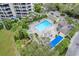 Resort-style pool and spa with surrounding patio at 2110 Harbourside Dr # 526, Longboat Key, FL 34228