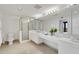 Elegant bathroom with a double vanity, large mirror, and shower at 2110 Harbourside Dr # 526, Longboat Key, FL 34228