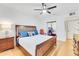 Serene bedroom with a king-size bed and ceiling fan at 2110 Harbourside Dr # 526, Longboat Key, FL 34228