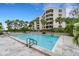 Inviting community pool with ample deck space at 2110 Harbourside Dr # 526, Longboat Key, FL 34228