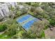 Two well-maintained tennis courts in a green space at 2110 Harbourside Dr # 526, Longboat Key, FL 34228