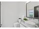 Modern powder room with marble countertop, vessel sink, and sleek fixtures at 2138 Floyd St, Sarasota, FL 34239