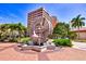 Cityscape view featuring a modern sculpture, office buildings, and lush palm trees on a sunny day at 2138 Floyd St, Sarasota, FL 34239