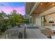 Covered patio features dining area and relaxing view of pool at 2138 Floyd St, Sarasota, FL 34239