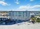 Aerial view of beachfront building and pool at 255 The Esplanade N # 506, Venice, FL 34285