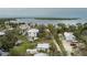 Aerial view of waterfront property with multiple houses at 29 Mound, Terra Ceia, FL 34250