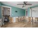 Under renovation: Bedroom featuring new flooring and exposed walls at 29 Mound, Terra Ceia, FL 34250