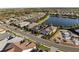 Wide shot of a residential neighborhood with a lake at 328 Aria Dr, Nokomis, FL 34275