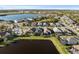 Community overview featuring lake and homes at 328 Aria Dr, Nokomis, FL 34275