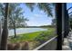 Scenic view of lake from covered patio at 328 Aria Dr, Nokomis, FL 34275