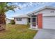 House exterior with brick facade and attached garage at 3608 Joyce Dr, Bradenton, FL 34208