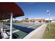 Outdoor shuffleboard courts with covered seating areas at 3608 Joyce Dr, Bradenton, FL 34208