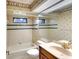 Bathroom with tub/shower combo and wood vanity at 3709 Wilderness W Blvd, Parrish, FL 34219