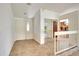 Bright entryway with tile flooring and a view of the kitchen at 3709 Wilderness W Blvd, Parrish, FL 34219