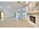 Living room featuring a stone fireplace and access to a patio at 3709 Wilderness W Blvd, Parrish, FL 34219