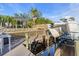 Private boat dock with covered boat lift and spacious deck at 3832 5Th Ne Ave, Bradenton, FL 34208