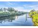 Scenic view of a peaceful canal with private docks at 3832 5Th Ne Ave, Bradenton, FL 34208