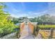 Private wooden dock offering direct access to the waterway at 3832 5Th Ne Ave, Bradenton, FL 34208