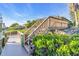 Wooden stairs and walkway leading to a waterfront dock at 3832 5Th Ne Ave, Bradenton, FL 34208