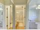 Bathroom with shower/tub and mirrored doors at 390 301 W Blvd # 11D, Bradenton, FL 34205