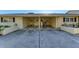 Attached garage with extra storage space at 390 301 W Blvd # 11D, Bradenton, FL 34205