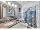 Bathroom with a neutral color scheme and a whimsical shower curtain at 395 W Rossetti Dr, Nokomis, FL 34275