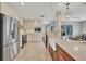 Kitchen boasts stainless steel appliances and a farmhouse sink at 395 W Rossetti Dr, Nokomis, FL 34275