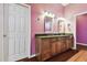 Double vanity bathroom with granite countertop and large mirror at 4338 14Th Street Cir, Palmetto, FL 34221