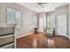 Bright bedroom with hardwood floors and window shutters at 4338 14Th Street Cir, Palmetto, FL 34221