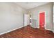 Hardwood floor bedroom with access to bathroom at 4338 14Th Street Cir, Palmetto, FL 34221