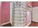 Glass block shower with pink walls at 4338 14Th Street Cir, Palmetto, FL 34221