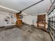 Attached garage with attic access and workbench at 4584 Country Manor Dr, Sarasota, FL 34233