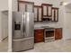 Kitchen with stainless steel appliances and wood cabinets at 4584 Country Manor Dr, Sarasota, FL 34233