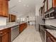 Modern kitchen featuring granite counters and stainless steel appliances at 4584 Country Manor Dr, Sarasota, FL 34233