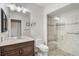 Clean bathroom with walk-in shower, toilet and vanity at 4655 Pine Green Trl # 24, Sarasota, FL 34241