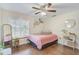 Bright bedroom with hardwood floors and plenty of natural light at 4655 Pine Green Trl # 24, Sarasota, FL 34241