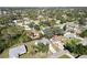 Aerial view showing a home's location within a residential neighborhood at 480 Azalea Rd, Venice, FL 34293